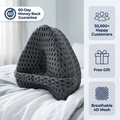 Coussin d'alignement des genoux ZenAlign posé sur un lit